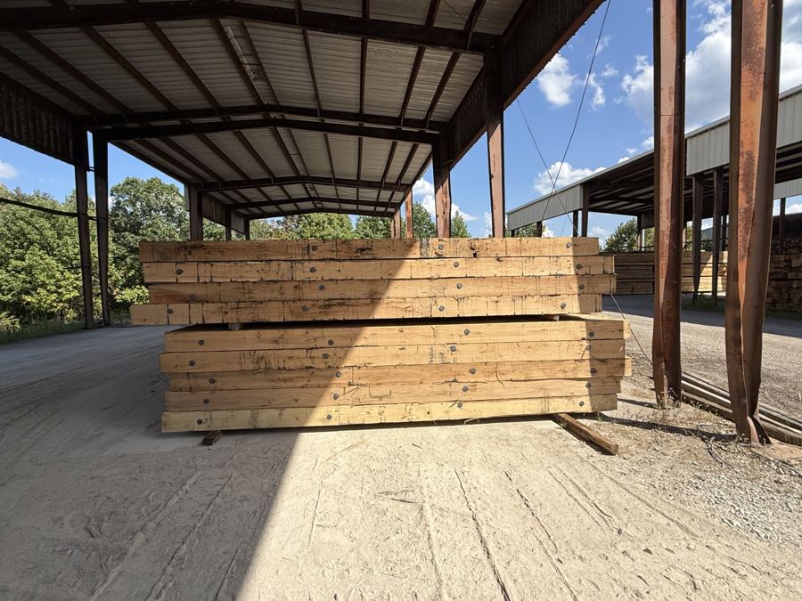 Bolted 8 inch by 16 foot solid hardwood mats, side view