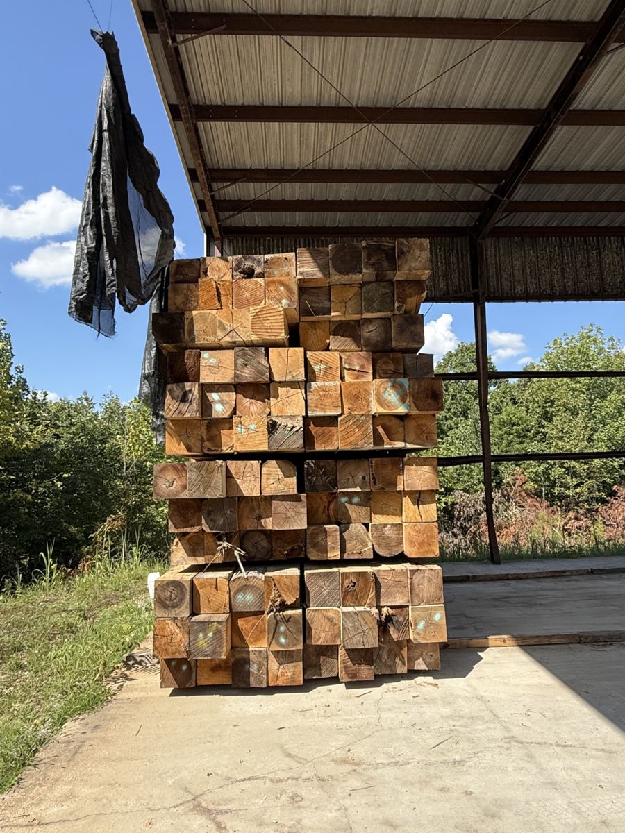 End view of stacked crane mat timbers